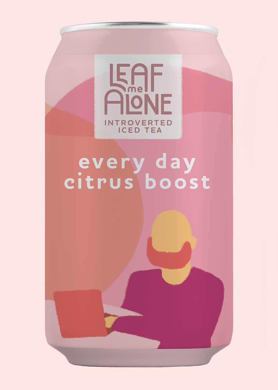 Mockup of an ice tea can from brand 'Leaf Me Alone'. The flavor is every day citrus boost and the can is illustrated with a figure working on a laptop.